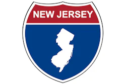 New Jersey state shield logo featuring white state map on navy blue background with red banner header