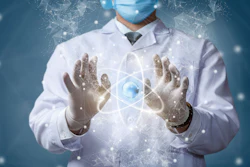 Scientist in lab coat holding glowing atomic symbol representing scientific innovation and research
