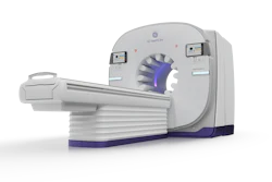 GE HealthCare CT scanner with gray housing, purple accent ring, and sliding patient table
